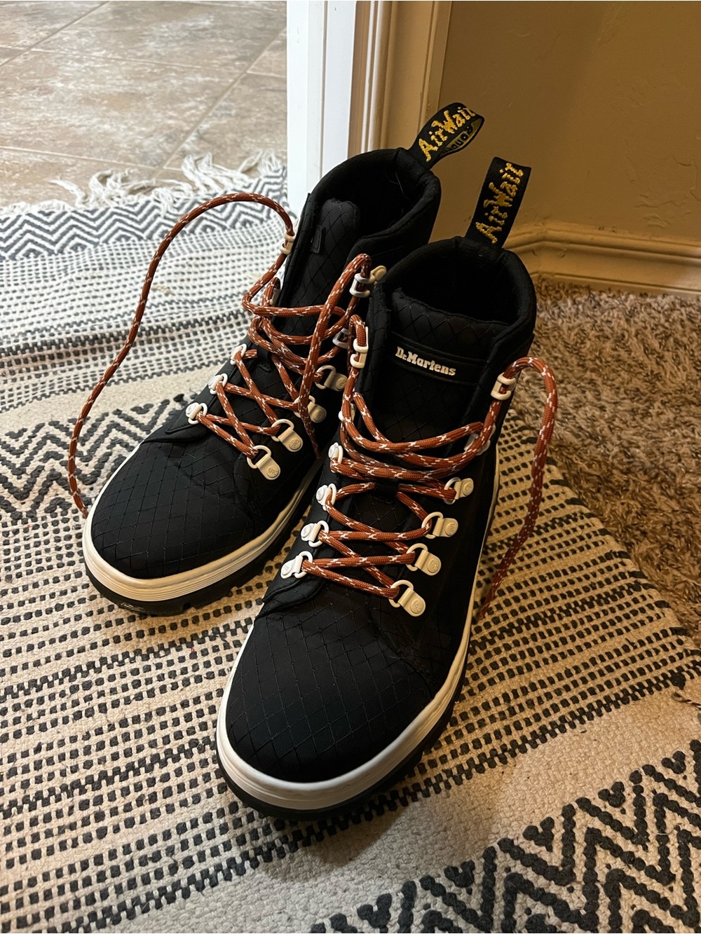 Dr. Martens Black Quilted High-Top Boots with Tan Rope Laces